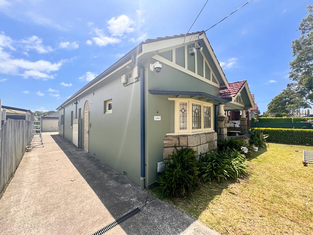 Heritage bungalow side view showing full exterior repaint