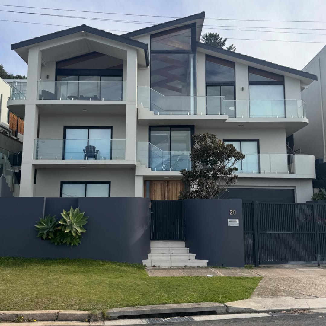 Modern coastal home exterior after a professional repaint