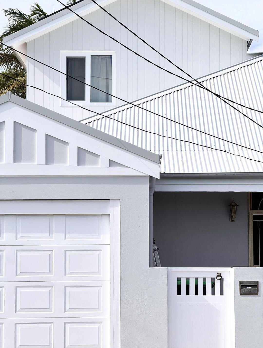 Detail of freshly painted white weatherboard cladding
