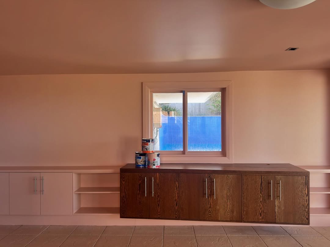 Detail of repainted kitchen cabinetry and hardware